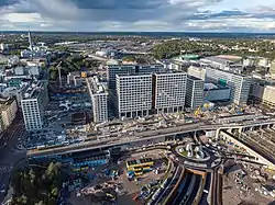 Pasila from the air in 2019. パシラ駅 is surrounded by office buildings and the Mall of Tripla, built in 2019.