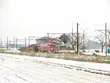 雪の中停車する車両（2005年12月）