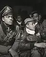 第332戦闘群パイロット、イタリアでのブリーフィングで。(1945年)