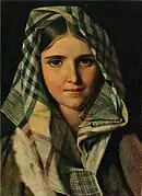 チェック柄のショールを纏う少女