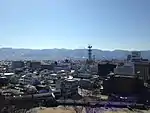 甲府城から南側を望む御坂山地越しの富士山の山頂部