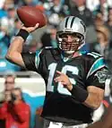 A picture of Vinny Testaverde while throwing a football.