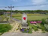 大池の曲がり角の「濡れ仏」（法界地蔵）