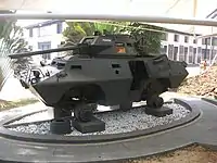 76mm砲を装備した、マレーシア軍のV-150 コマンドウ。車輪は外されている